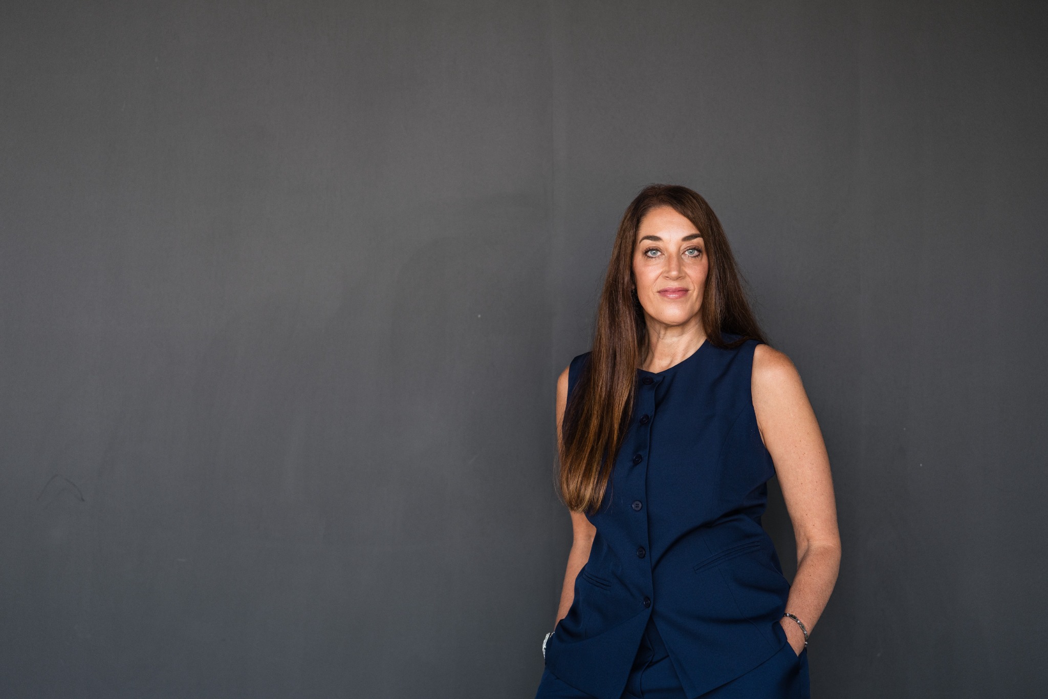 Jennifer Soler in a navy outfit